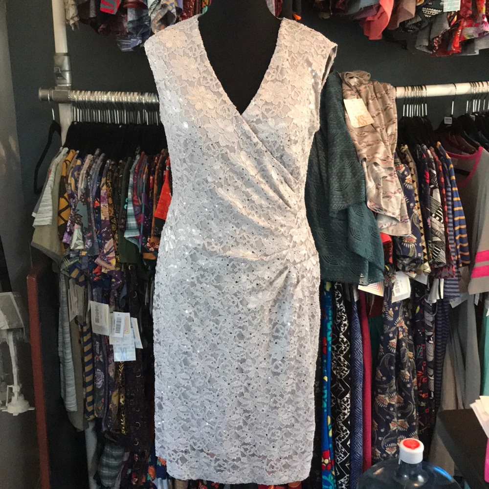 Cocktail dress. Grey lace, with silver sequin